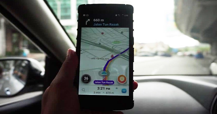 You Can Get Summoned For Holding Your Phone While Driving, Even While Using Waze - World Of Buzz 2