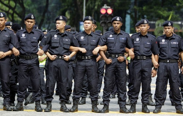 malaysia police uniform arm link Image from nairaland.com .
