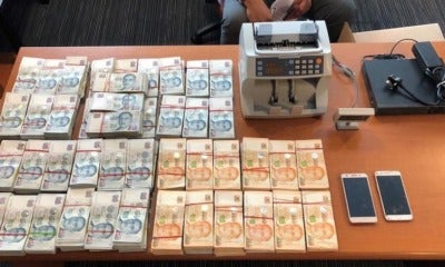 Msians Trick Locals Into Transferring Rm1.7 Million In Singapores Largest Scam Of The Year - World Of Buzz