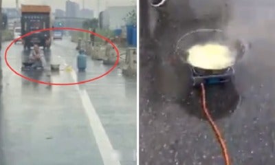 Man Bizarrely Starts To Cook Noodles In The Middle Of The Road, Causes Massive Jam - World Of Buzz 4