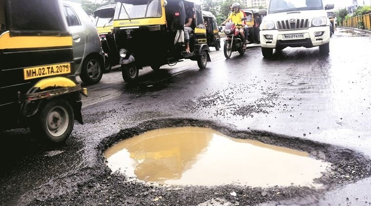 Indian Man Fills Potholes In Honour Of His Dead Son - WORLD OF BUZZ 2