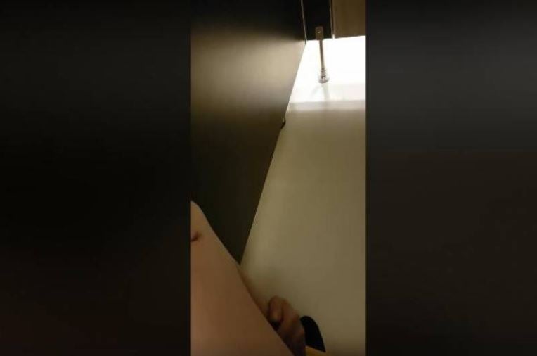 [Watch] Creepy Peeping Tom Pokes Head into Toilet Cubicle to Stroke Pooping Man's Leg - WORLD OF BUZZ 3