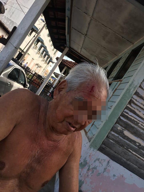 Watch: Man Brutally Beats Old Uncle For Telling Him To Park Somewhere Else - World Of Buzz 1
