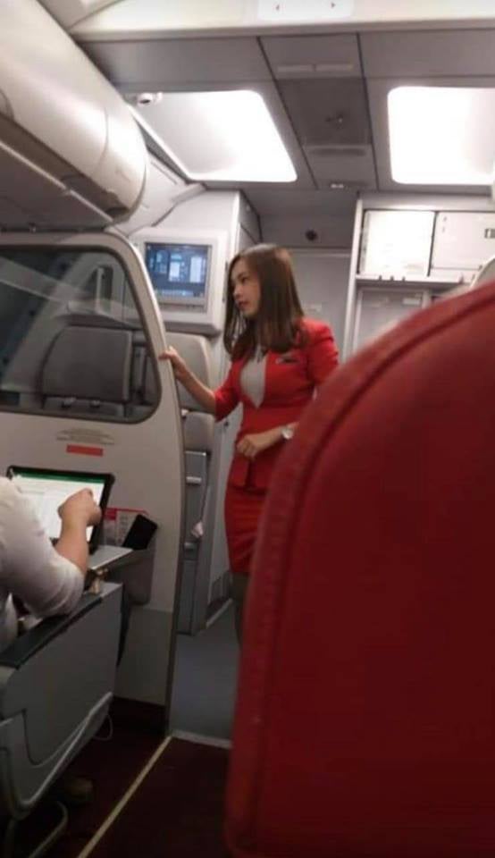 These Candid Photos Of Airasia Flight Attendant Has Netizens' Hearts Taking Flight - World Of Buzz 1