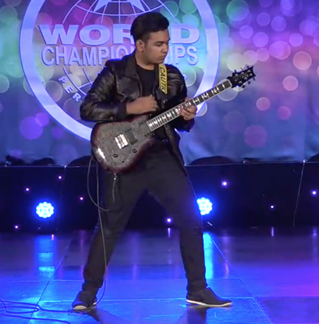 This 16yo M'sian Made It to World Championship By Playing Guitar Blindfolded and with Two Hands - WORLD OF BUZZ