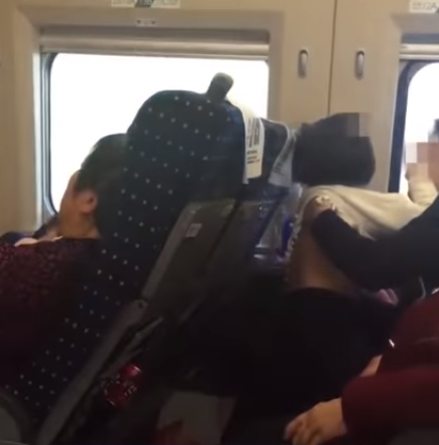 Train Passengers Shocked By Father Kissing and Inserting Hands In Young Daughter's Pants - WORLD OF BUZZ