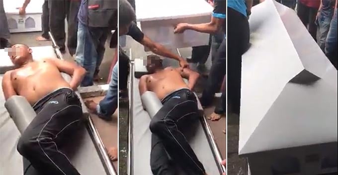 Man Tries to Break into Car in Shah Alam, Gets Caught & Put in Coffin as Punishment - WORLD OF BUZZ