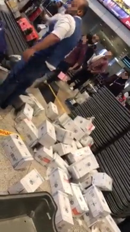 Netizen Shocked By KLIA Staff Throwing Boxes of Zam Zam Water On Floor, Here's What Staff Says - WORLD OF BUZZ 2