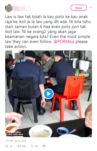 Netizens Triggered At Video Of Cops Puffing Away At Eateries, Despite Smoking Ban - World Of Buzz 1