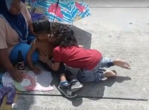 Watch: 2-Year-Old Boy Giving His Shoes To A Homeless Child Will Melt Your Heart - World Of Buzz 1
