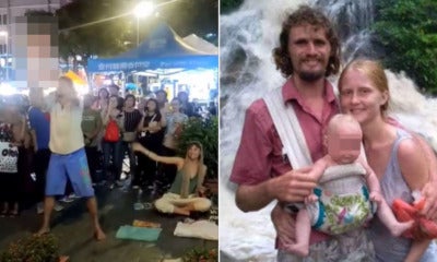 'Begpacker' Swinging Baby In Bukit Bintang Says It'S Actually &Quot;Exercise&Quot;, Turns Out It'S Popular In Russia - World Of Buzz