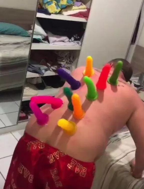 Man Wakes Up To Find His Friends Superglued 10 Dildos To His Back As A Prank - WORLD OF BUZZ 1