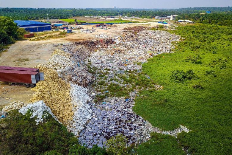 Massive Illegal Plastic Landfill Found In Penang With "6 Football Fields" Worth Of Trash Piled Two Stories High - WORLD OF BUZZ