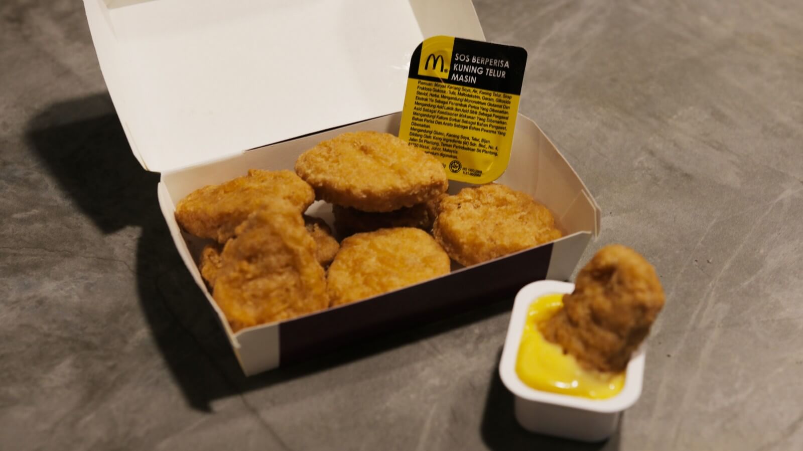 We Tried McDonald's New Salted Egg Yolk McNuggets Sauce and Loaded Fries, and Here's The Load-Down - WORLD OF BUZZ