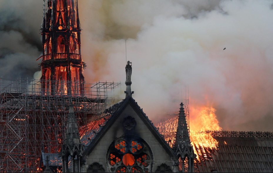 BREAKING: Massive Fire Burns Notre Dame Cathedral in Paris - WORLD OF BUZZ 4