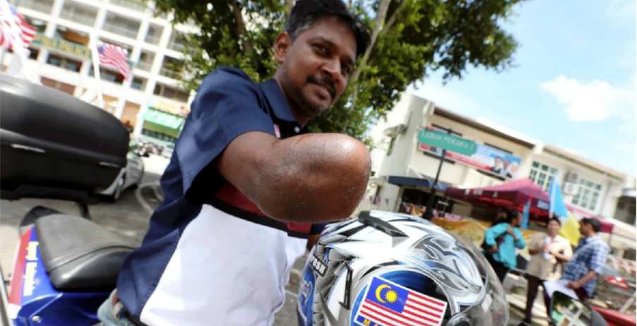 Disabled Man Rides Bike Around Peninsula Within 24 Hours, Breaks Malaysian Record - World Of Buzz 2