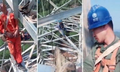 Fearless Electric Workers Take A Nap 164 Feet In The Air With Only Ropes To Support Them - World Of Buzz 1