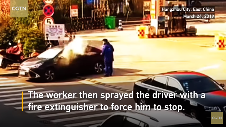Frustrated Petrol Station Staff Sprays Fire Extinguisher Directly In Stubborn Smoker's Face - WORLD OF BUZZ