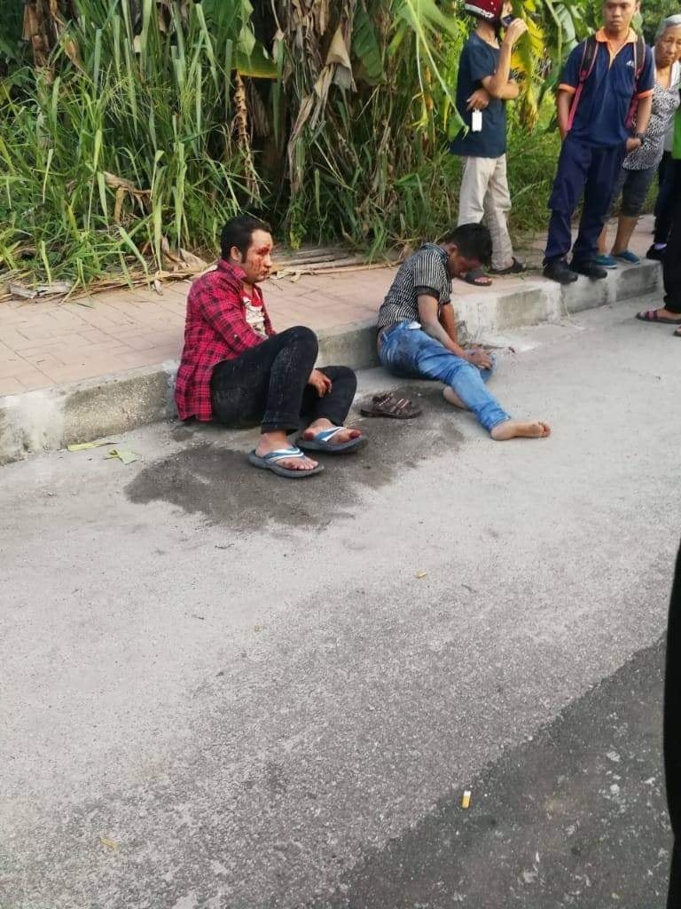 Passersby Beat Up 2 Foreign Workers For Molesting Female Driver In Penang - World Of Buzz