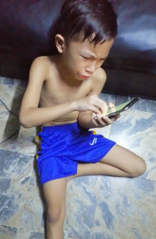 Watch: Boy Cries As His Mobile Legend Account is Banned for 10,949 Days, - WORLD OF BUZZ
