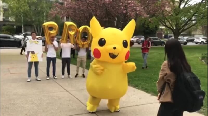 Watch: Guy Surprises Girl With Promposal in Cute Pikachu Costume & She Said Yes! - WORLD OF BUZZ 1