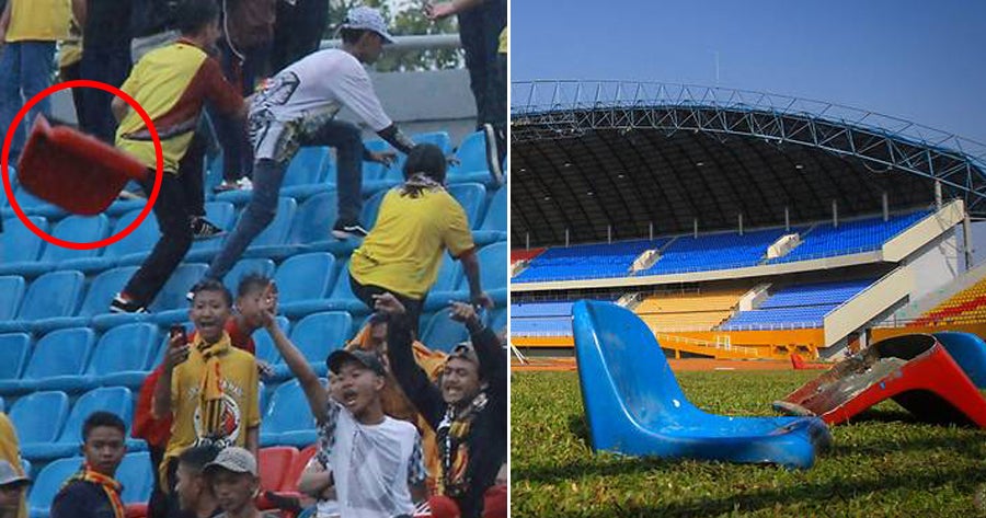 Dad Literally Uses Son As A Weapon To Hit A Rival Fan At The Stadium - World Of Buzz