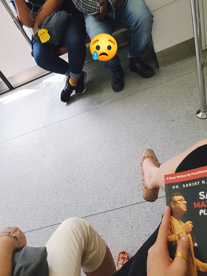 Kind Lady Rescues Foreign Worker Who Was Forced To Stand After Aunty Didn't Want To Sit With Him On Train - World Of Buzz