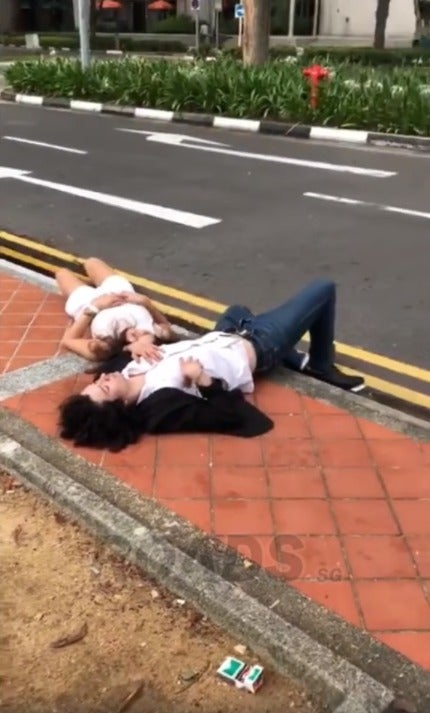 Man Finds Couple Passed Out By The Roadside, They're So Drunk That His Shouts Couldn't Wake Them Up - World Of Buzz 2