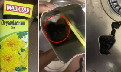 Woman Shocked To Find Thick Black Substance In Her Marigold Drink, Claims She Had Food Poisoning - World Of Buzz