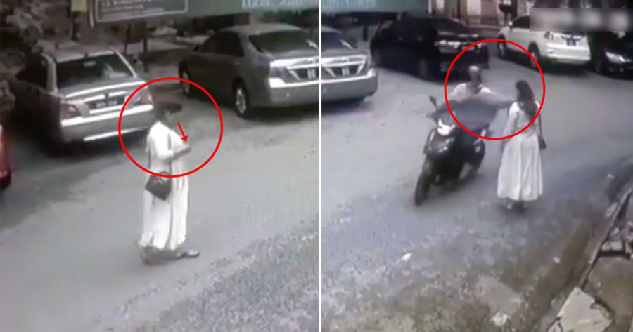 [Video] M'Sian Woman Mindlessly Crossed Road While Looking At Phone, Snatch - World Of Buzz
