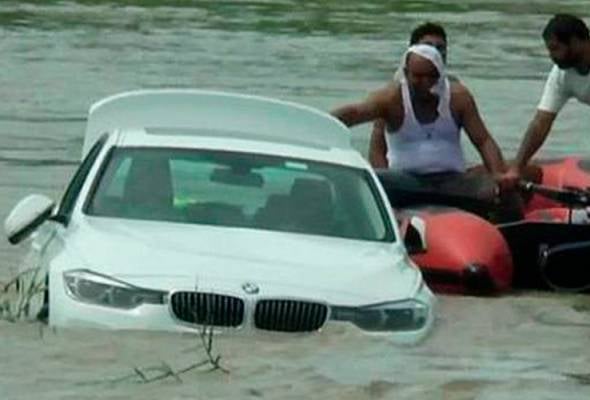 22yo Man Gets BMW From Parents For Birthday, Dumps It Into River Because He Wanted A Jaguar Instead - WORLD OF BUZZ
