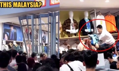 M'Sians Rip A Uniqlo Outlet Apart Just To Get The Kaws:summer Collection T-Shirts - World Of Buzz