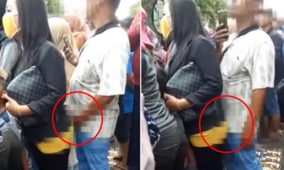 [Video] Hamsap M'Sian Man Pleasures Himself Behind Woman &Amp; Presses Crotch Against Her - World Of Buzz
