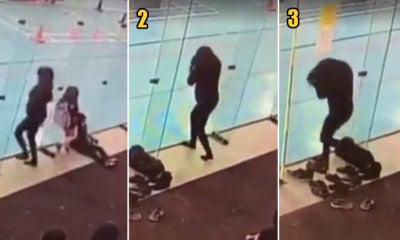 [Watch] Woman Hilariously Bumps Into Glass 3 Times In A Row &Amp; We'Re Embarrassed For Her - World Of Buzz