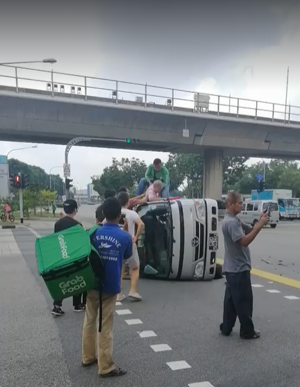 Heroic Grab Food Rider Breaks Window &Amp; Rescues 70Yo Uncle Trapped In A Toppled Van - World Of Buzz