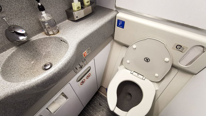 Malaysian Man Caught Installing Spy Cam In The Bathroom Of An American Flight - World Of Buzz