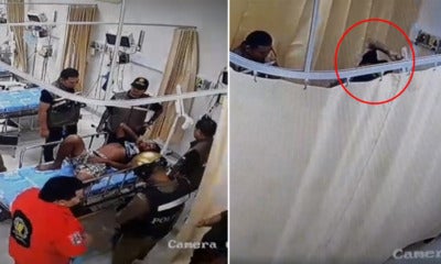 Watch: 'Volunteer Rescuer' Violently Whacks Man On Hospital Bed As Police W - World Of Buzz