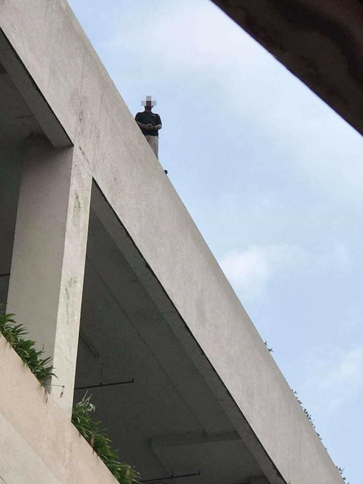 Bomba &Amp; Pdrm Saves Man Attempting To Jump From Rooftop Because Of Argument With Parents - World Of Buzz