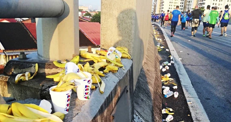 Standard Chartered Marathon Runners Trash DUKE Highway with Banana Peels and Cups - WORLD OF BUZZ