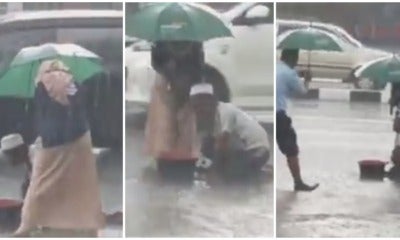 Good Samaritan Provides Much Needed Shelter For Oku Braving The Rain - World Of Buzz 3