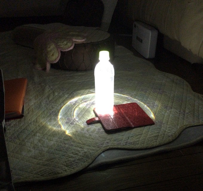 Man Uses Water Bottle, Milk And Smartphone To Make Lamp After Super Typhoon Knocked Out Power In Japan - WORLD OF BUZZ 1