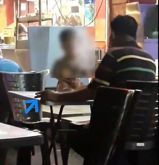 Watch: Irresponsible M'sian Father Smokes in Public, Purposefully Blows the Residue to His Toddler Son - WORLD OF BUZZ