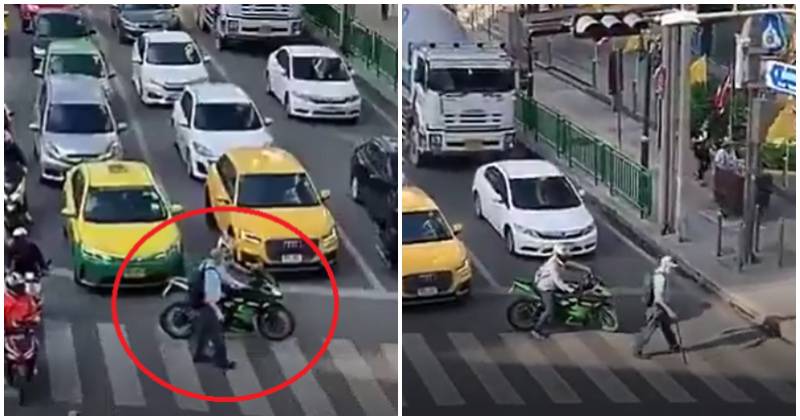 Watch: Kind Motorcyclist Block Heavy Traffic So That Blind Man Can Cross The Road - WORLD OF BUZZ