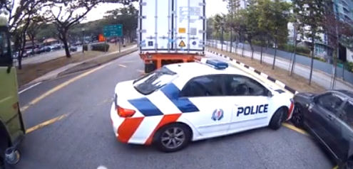 Watch: S'porean Police Car Driver's Hilariously Bad Driving Causes Accident - WORLD OF BUZZ
