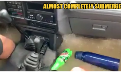 Watch: Driver Decides To Drive Into Flood Waters, Gets Almost Completely Submerged But Comes Out Safely - World Of Buzz