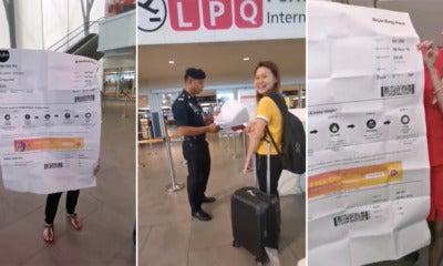 M'Sian Girl Gets Hilariously Pranked By Friends Who Printed A Humongous Boarding Pass For Her - World Of Buzz