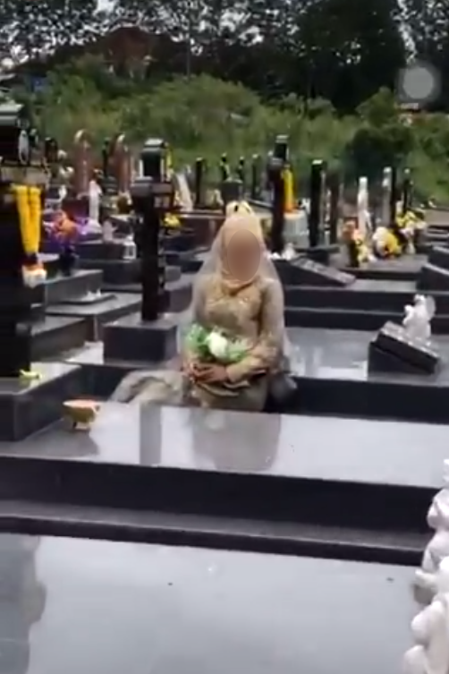 M'sian Woman Gets Public Backlash After Having Bridal Photoshoot In Christian Cemetery - WORLD OF BUZZ