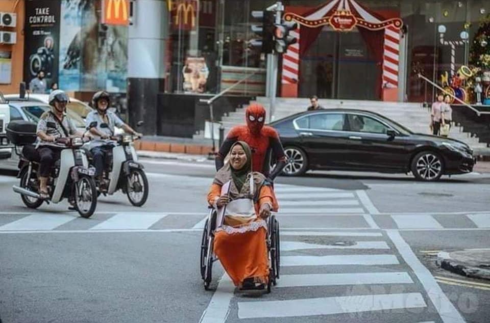 Spiderman spread his web to take care of disabled wife - WORLD OF BUZZ 1