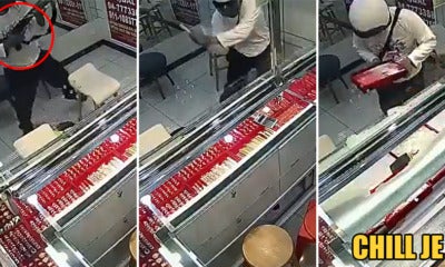 Watch: Robber Casually Walks Into Jewellery Shop, Takes Out Rifle  &Amp; Starts Whacking Glass With Axe - World Of Buzz