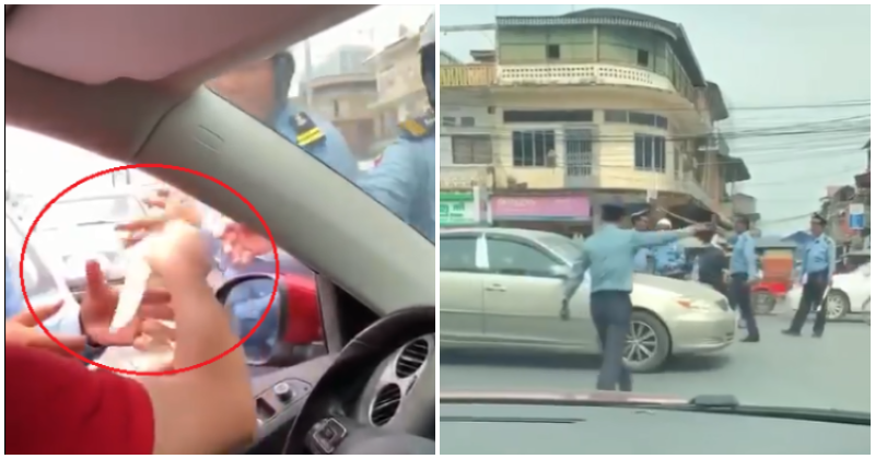 Man Openly Hands Bills of Cash To Traffic Officers, Get - WORLD OF BUZZ